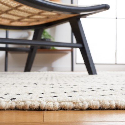 Black and Ivory Hand-Tufted Wool 8' x 10' Shag Rug