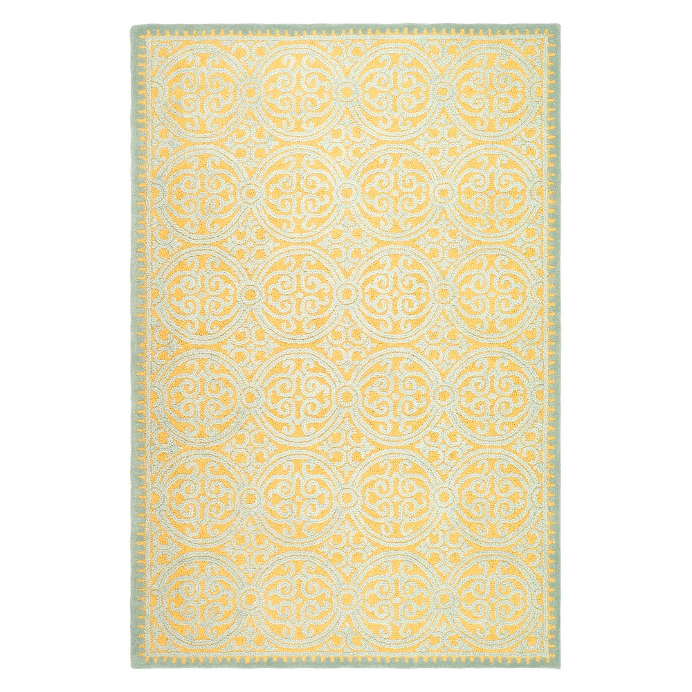 4'x6' Medallion Tufted Area Rug Blue/Gold - Safavieh