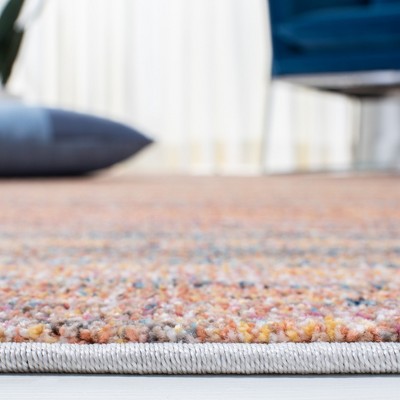 Rust and Blue Abstract Rectangular Synthetic Area Rug