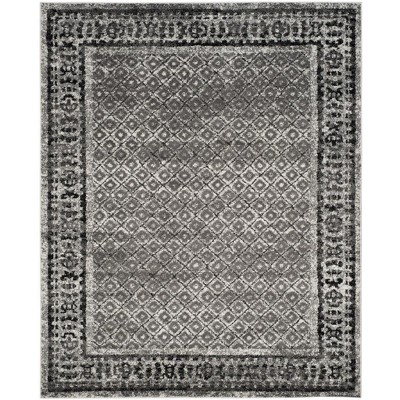 Ivory and Silver Geometric 9' x 12' Synthetic Area Rug