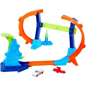 Hot Wheels Toy Car Track Set, Flip & Jump Through The Corkscrew Loop with 1:64 Scale  Car - 1 of 4