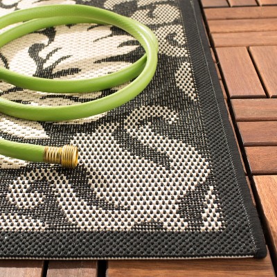 Black and Sand Floral Motif Indoor/Outdoor Area Rug
