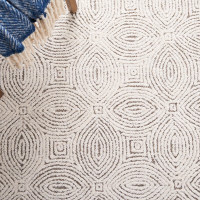Handmade Ivory and Beige Wool Abstract 6' x 9' Area Rug