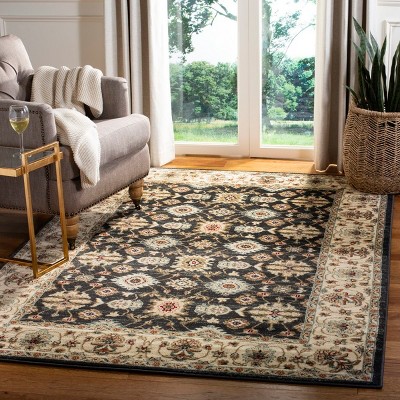 Navy and Cream 5' x 7' Traditional Synthetic Area Rug