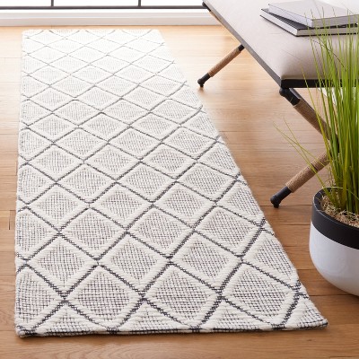 Elegant Marbella Handwoven Flatweave Black & Ivory Wool Rug