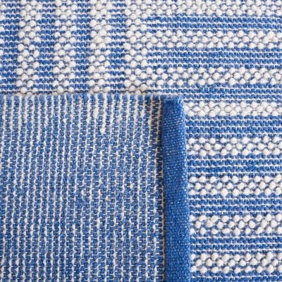 Ivory and Blue Flat Woven Wool Area Rug