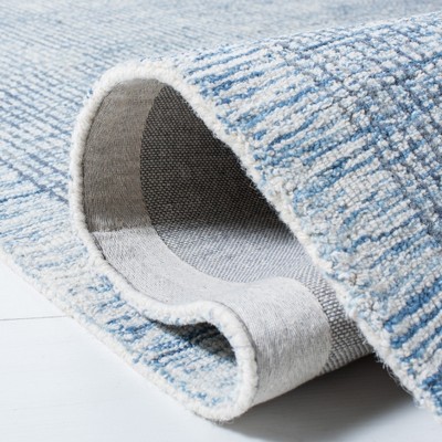 Ivory and Blue Hand-Tufted Wool 4' x 6' Area Rug