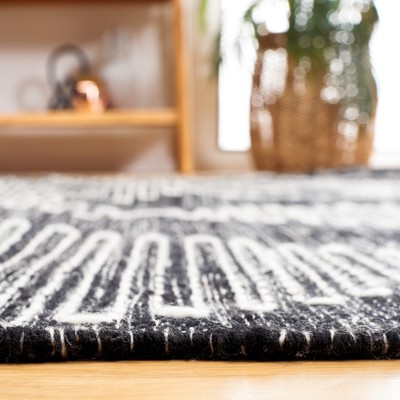 Bohemian Nomad Black and Ivory Handwoven Kilim Rug - 5' x 8'