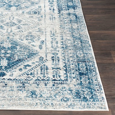 Elegant Sky Blue 9' x 12' Synthetic Stain-Resistant Area Rug