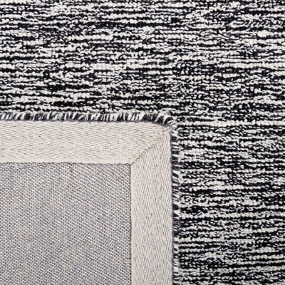 Black and Ivory Abstract Handmade Wool Tufted Rug, 8' x 10'