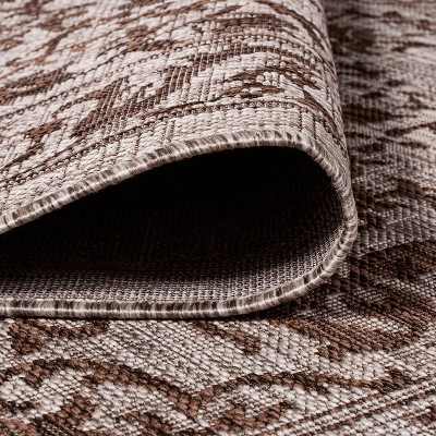 Ivory and Brown Medallion 8' x 10' Synthetic Rug