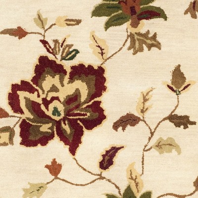 Ivory and Multicolor Floral Tufted Wool 4' x 6' Area Rug