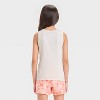 Girls' Moana Ribbed Ruffle Hem Tank Top - Off-White - 3 of 4