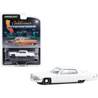 1972 Cadillac Sedan deVille Lowrider Cotillion White with Blue Interior 1/64 Diecast Model Car by Greenlight