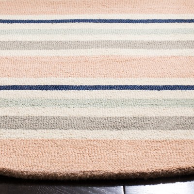 Ivory and Multi-Color Round Wool Kids Rug