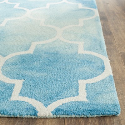Turquoise and Ivory Hand-Tufted Wool Area Rug 5' x 8'