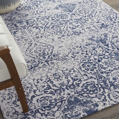 Ivory and Navy Medallion Synthetic 4' x 6' Area Rug