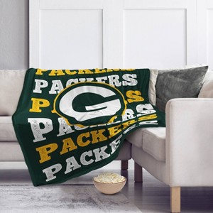 NFL Green Bay Packers Repeat Refresh Wordmark Flannel Fleece Throw Blanket - 1 of 3