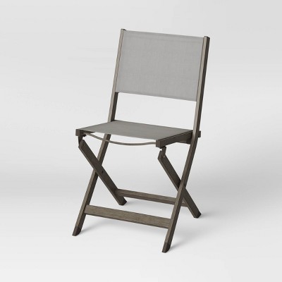 Photo 1 of Weathered Teak Folding Patio Bistro Chair - Threshold