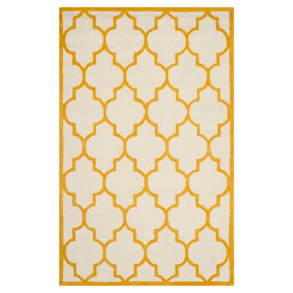 5'X8' Geometric Area Rug Ivory/Gold - Safavieh