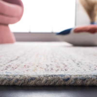 Handmade Red and Ivory Abstract Wool Area Rug, 4' x 6'