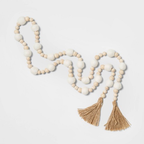 6' Wood Beaded Christmas Garland with Gold Tassels White/Natural - Wondershop™ - image 1 of 2
