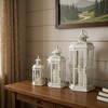 HomeRoots Set of Three White Distressed Filigree Metal Tabletop Lantern Candle Holders - 2 of 4