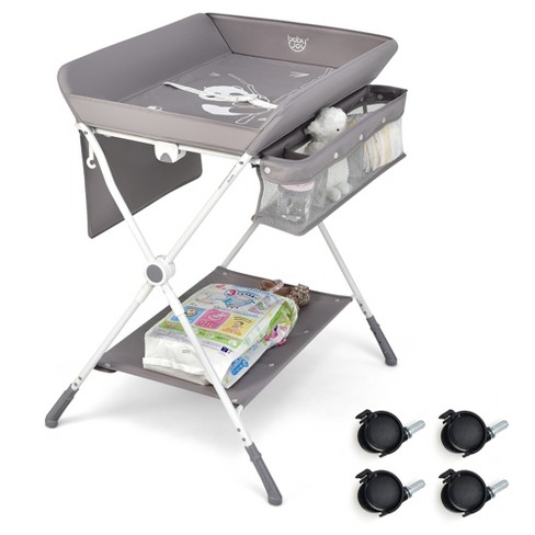 Folding diaper outlet changing table