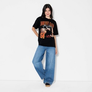 Women's Cash Ring of Fire Oversized Short Sleeve Graphic T-Shirt - Black - 1 of 3
