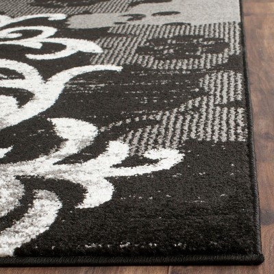 Elegant Black/Silver 9' x 12' Reversible Synthetic Area Rug