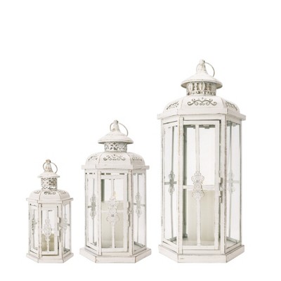 HomeRoots Set of Three White Distressed Filigree Metal Tabletop Lantern Candle Holders