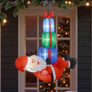 NAYSAYE 5FT Santa Claus Inflatable Hanging Under Gift Boxes Christmas Decoration Festive Holiday Yard Display for Home Garden, 45.3"*19.7"*55.1" - 1 of 4