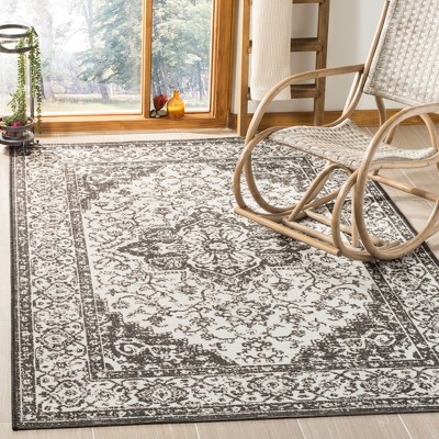 Linden Light Grey & Charcoal Geometric Synthetic Area Rug - 6'7" x 9'2"