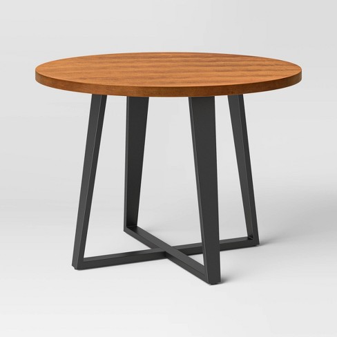 Wood and metal round deals dining table