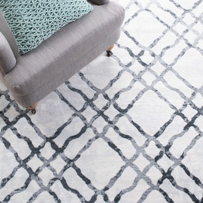 Ivory and Grey 4' x 6' Hand-Knotted Synthetic Area Rug