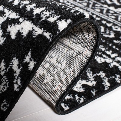 Bohemian Bliss Geometric Black & Ivory Synthetic Area Rug - 8' x 10'