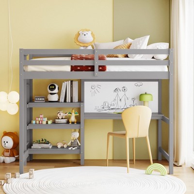 Gray loft bed with integrated desk and shelves against yellow wall