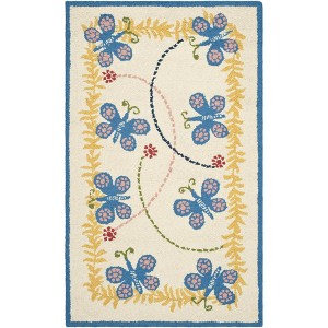 Safavieh Kids SFK390 Hand Tufted Indoor Rug - Safavieh - 1 of 3