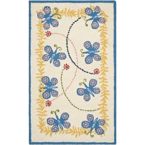 Safavieh Kids SFK390 Hand Tufted Indoor Rug - Safavieh - image 1 of 3