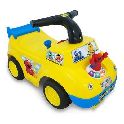 Kiddieland 055095 Elmo's Fun Learning School Bus Toddler Kids Ride On Toy Car with Music, Colorful Gear Dashboard, and Bright Flashing Lights