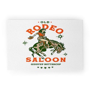 The Whiskey Ginger Old Rodeo Saloon Giddy Up Buttercup 30" x 20" Welcome Mat - Society6 - 1 of 3