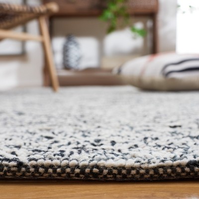 Black and Ivory Hand-Tufted Wool 8' x 10' Area Rug