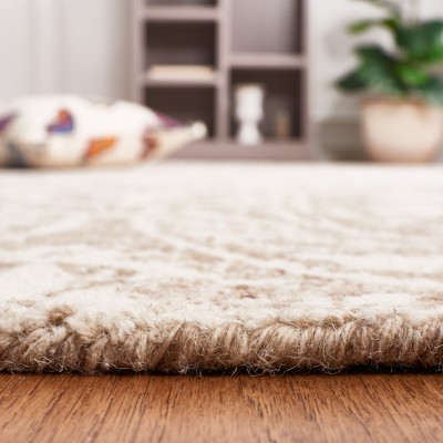 Ivory and Beige Abstract Handmade Wool 4' x 6' Area Rug