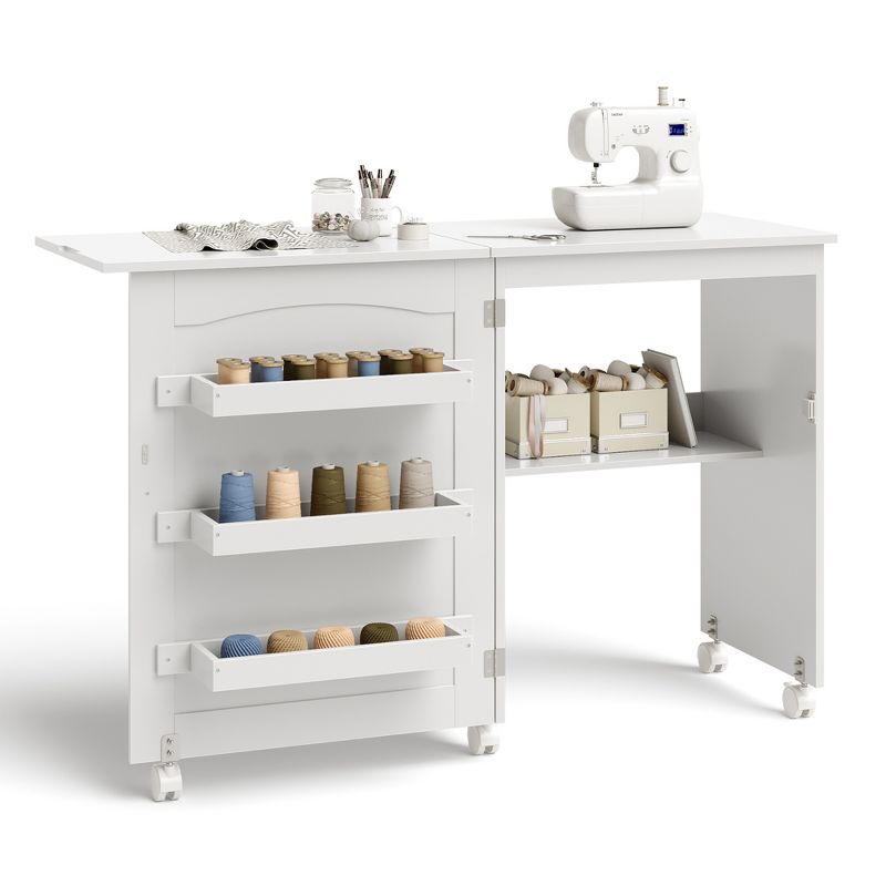 Costway White Folding Sewing Craft Table with Storage Shelves Cabinet Lockable Wheels, 1 of 11