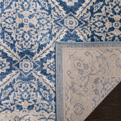 Navy and Cream Synthetic Bohemian Area Rug with Border Embellishment