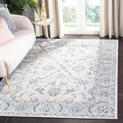 Brentwood 5'3" x 7'6" Blue Synthetic Stain-Resistant Area Rug
