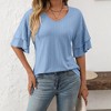 Clearlove Women's V-Neck Peplum Top with Textured Detail - 2 of 4