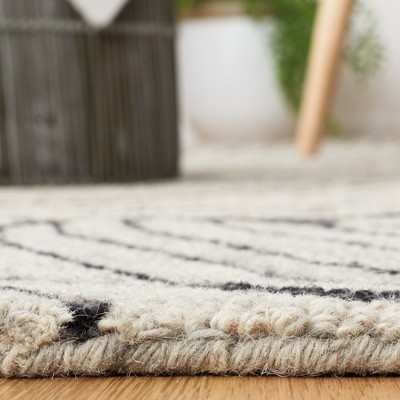 Hand-Tufted Black and Ivory Wool Floral Area Rug