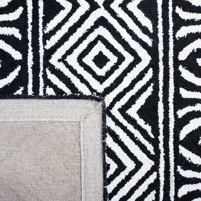 Capri Black and Ivory Hand-Tufted Wool 4' x 6' Area Rug