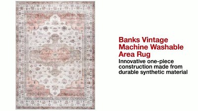 4' x 6' Orange and White Medallion Washable Synthetic Rug